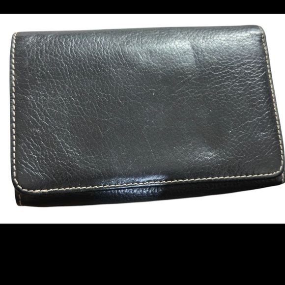 Black Leather Wallet by Danier Leather. - Picture 1 of 7